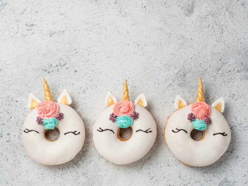 Unicorn donuts with copy space